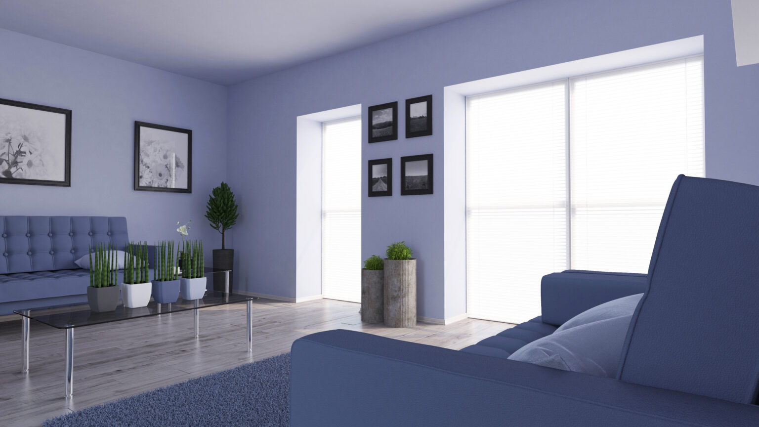 espacio interior minimalista con paredes azules tras reforma de vivienda en Barcelona